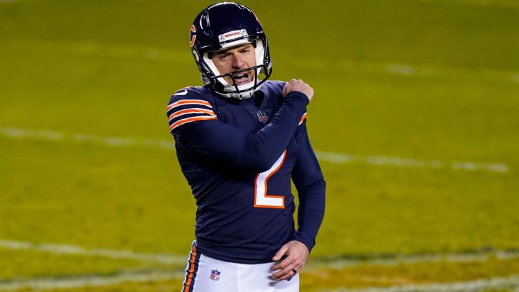 Chicago Bears long snapper Patrick Scales (48) and place kicker Cairo  Santos (2) celebrate the Bears